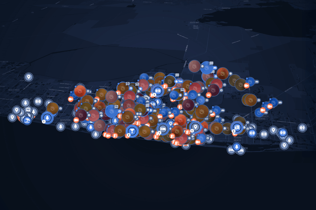 A digital map with numerous colored icons and circles clustered over an urban area, indicating various points of interest or incidents.